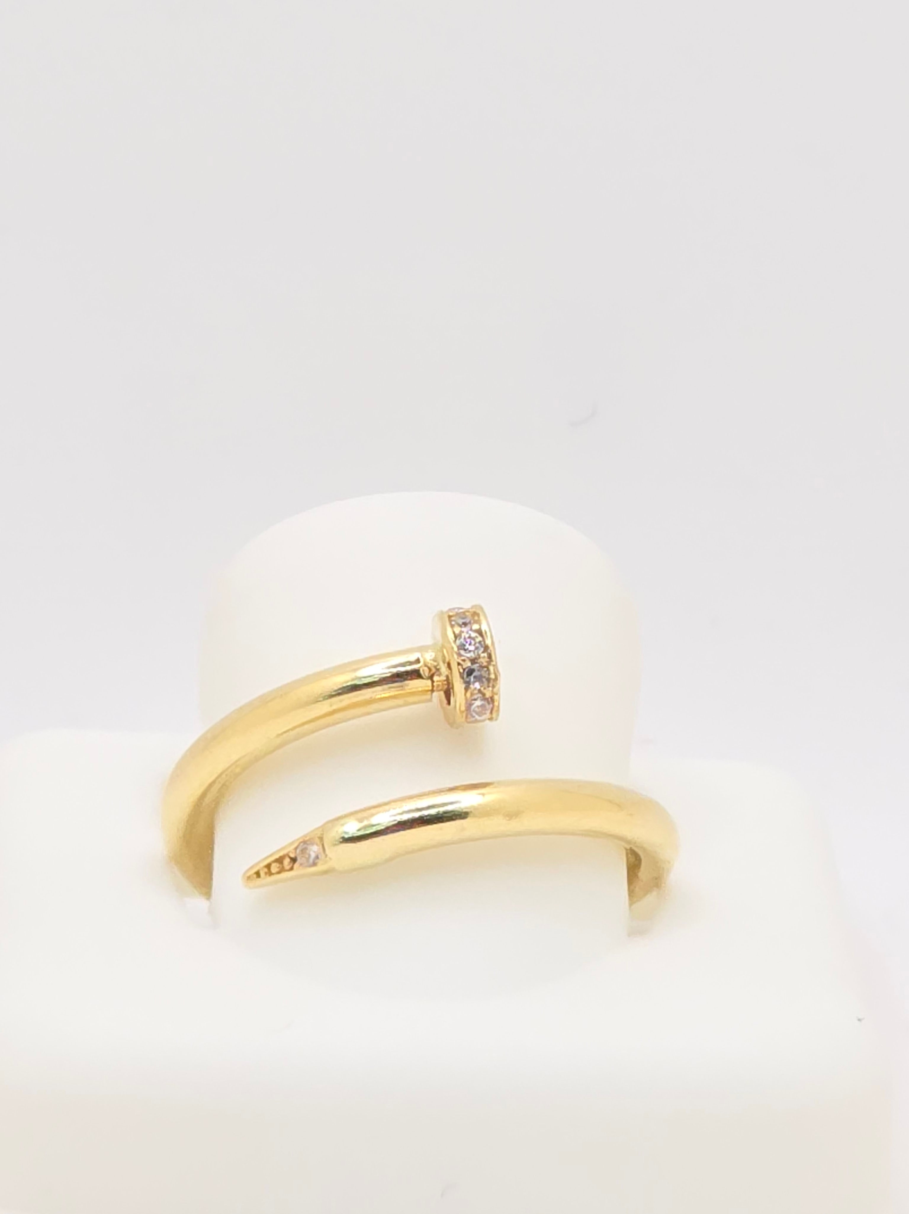 14KT ELEGANT AND SIMPLE RING WITH DETAILS OF AN EXOTIC NAIL Size 6 & 7 Weight 1.2GR