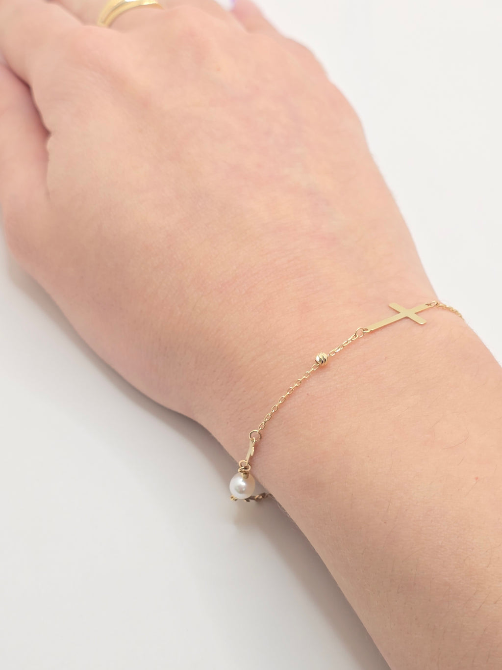 14KT CROSS AND WHITE PEARL BRACELET Size 8INCH Weight 1.7GR