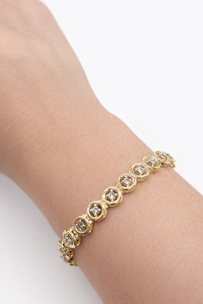 14KT YELLOW GOLD ROUND STYLE DIAMOND TENNIS BRACELET Size 7.5MM 7IN Weight 20 GRS
