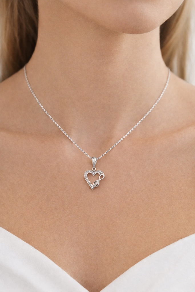 10KT WHITE GOLD  HEART WITH INFINITY  DIAMOND PENDANT Size  Weigth 0.9GR