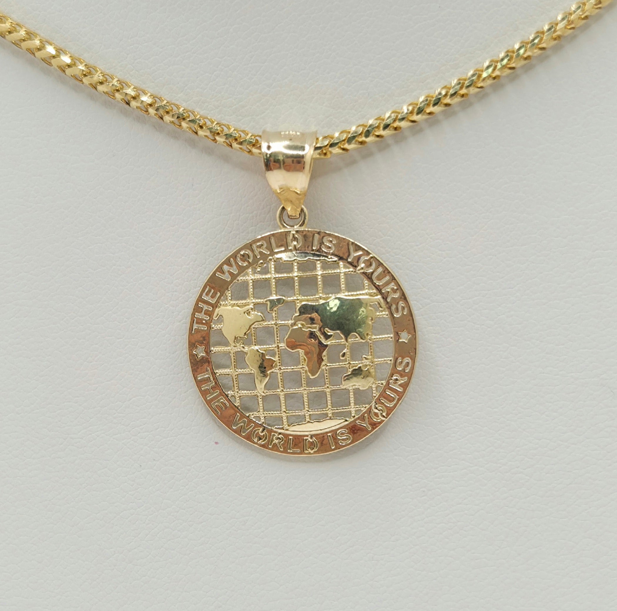 10KT EXTRA SMALL THE WORLD IS YOURS GLOBE PENDANT Weight 1.5GR