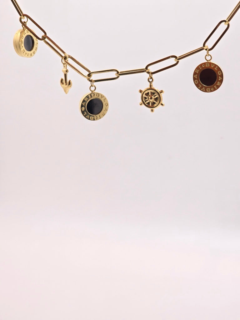 10KT CHARMS BRACELET 7INCH