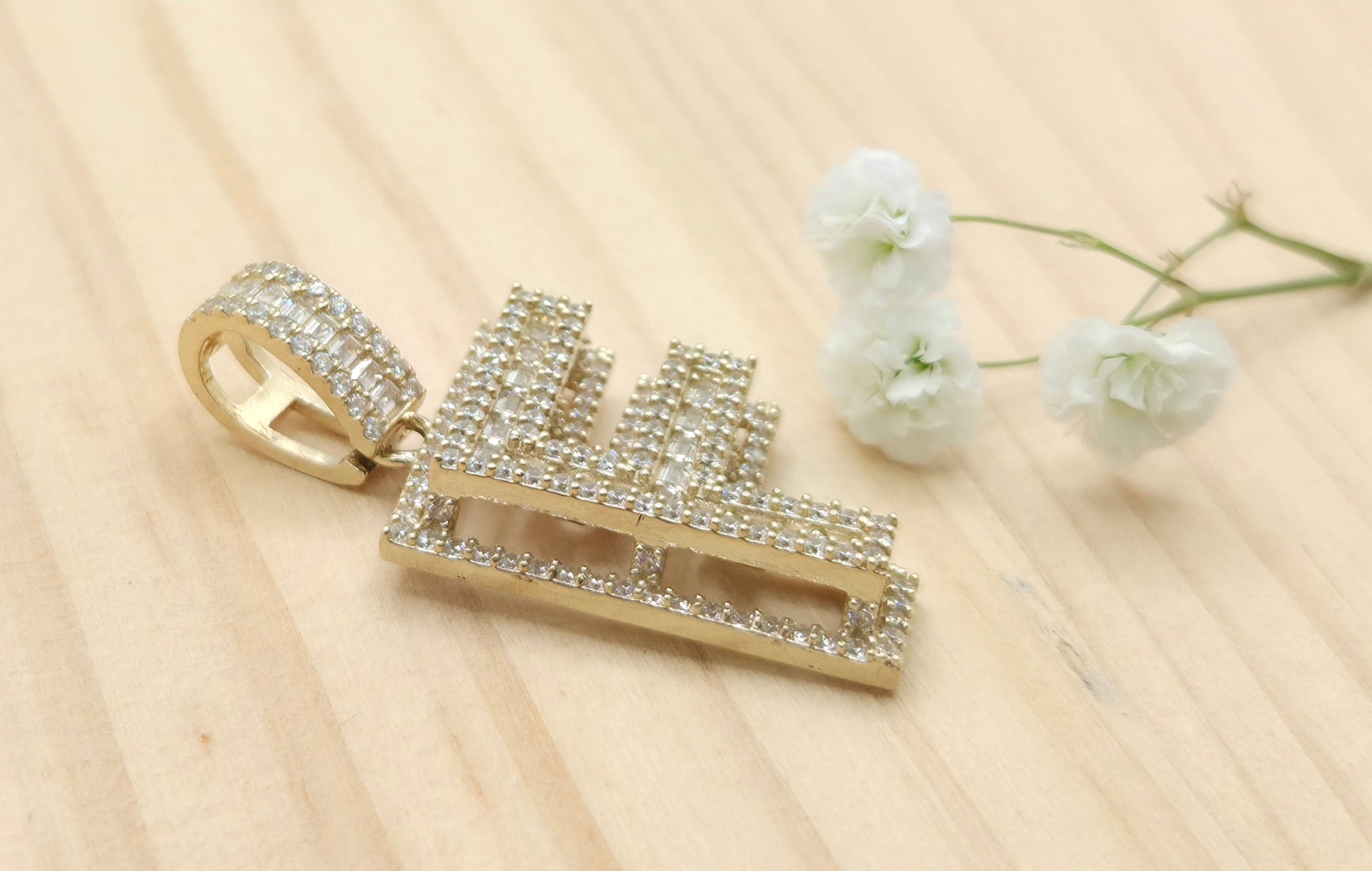 10KT SMALL CZ "F" LETTER PENDANT Weight 4.3GR