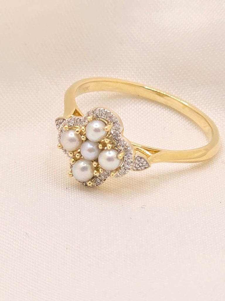 10KT FLOWER RING Size 10MM SIZE 7 Weigth 2.1 GRS