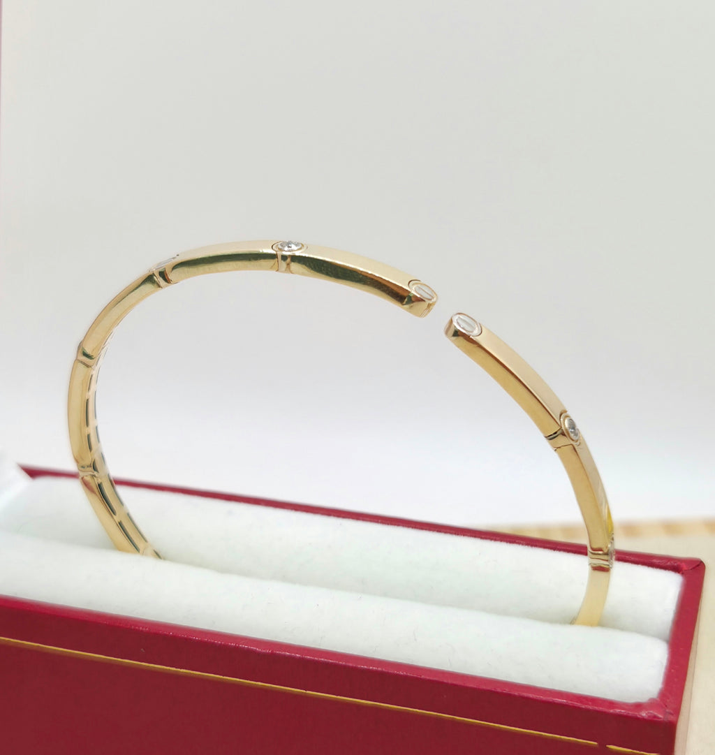 14KT TWO TONE CARTI DESIGN BANGLE Weight 6.7GR