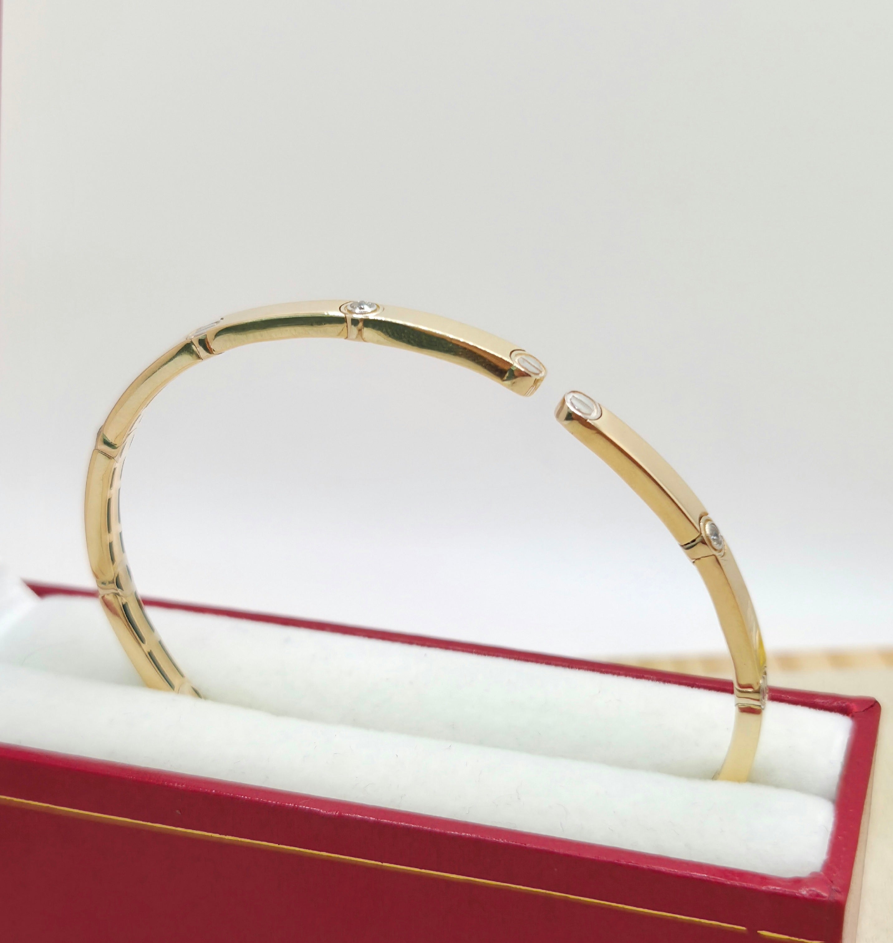 14KT TWO TONE CARTI DESIGN BANGLE Weight 6.7GR